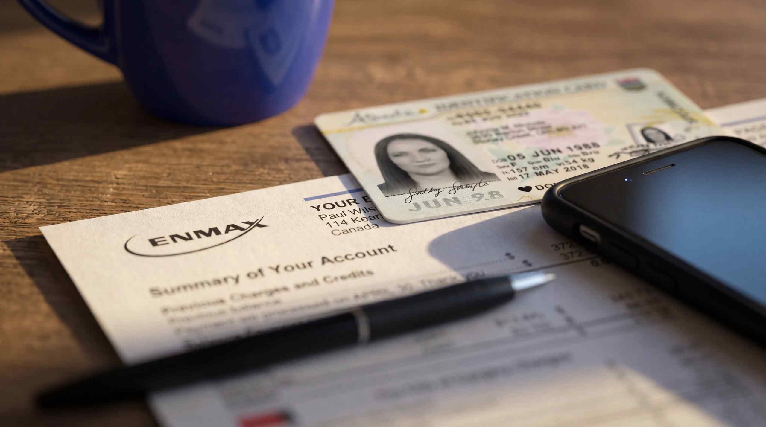 A couple of documents used for sweepstakes verification including driver's license and utility bill.